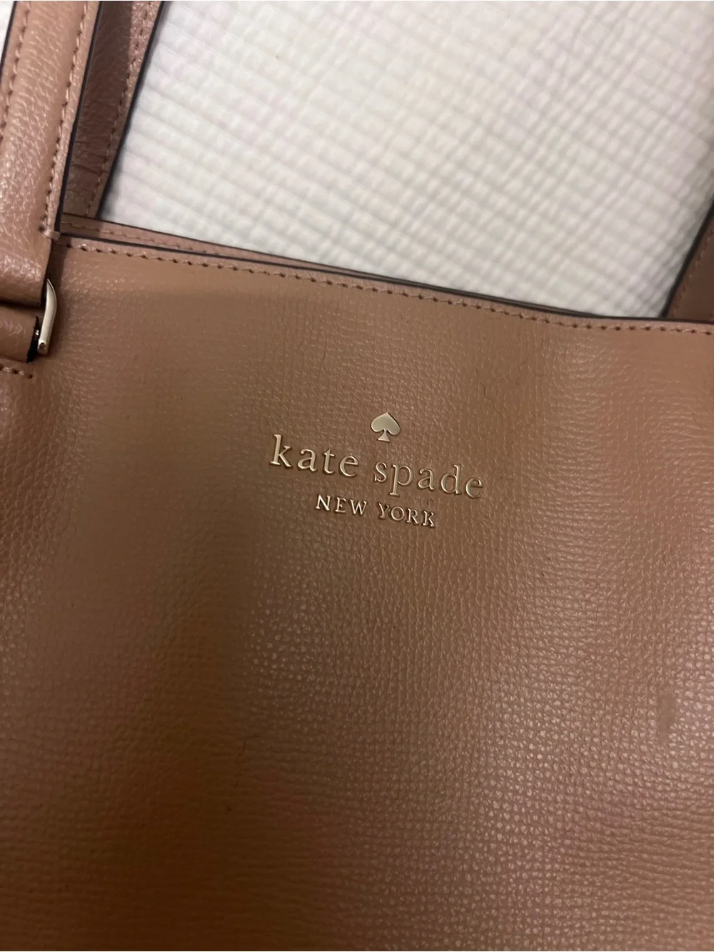 kate spade New York blush tan leather tote with gold logo